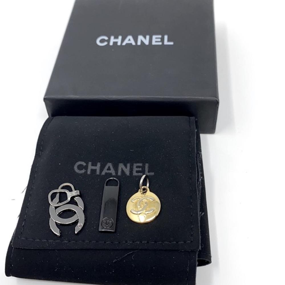 Three CHANEL Metal Zipper Pull